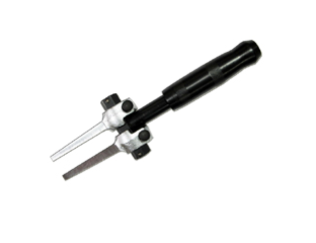 DUAL-FUNCTION TIE ROD HANDLE ACCESSORY.